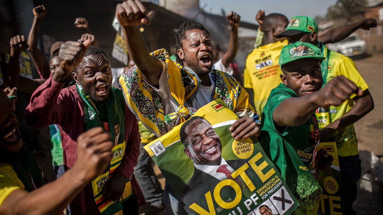 Supporters celebrate after Mnangagwa is declared the winner in Zimbabwe's landmark election.