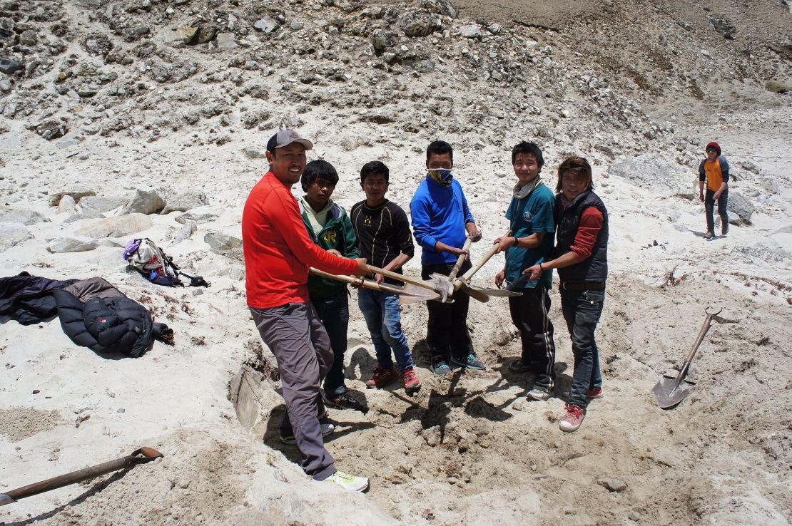 Researchers from the Mount Everest Biogas Project test soil at Gorak Shep.