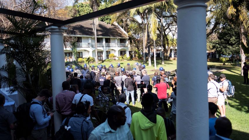 Zimbabwe anti-riot personnel (REAR) deploy at The Bronte Hotel in Harare on August 3, 2018, where international journalists and observers are gathered for a press conference by MDC leader Nelson Chamisa. (Photo by MARCO LONGARI / AFP)        (Photo credit should read MARCO LONGARI/AFP/Getty Images)