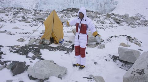 Higher up the mountain where facilities are scarce, climbers are encouraged to deposit their bodily waste in disposable bags and bring it back down with them, explains adventurer Ben Fogle, pictured alongside a makeshift toilet in a tent.