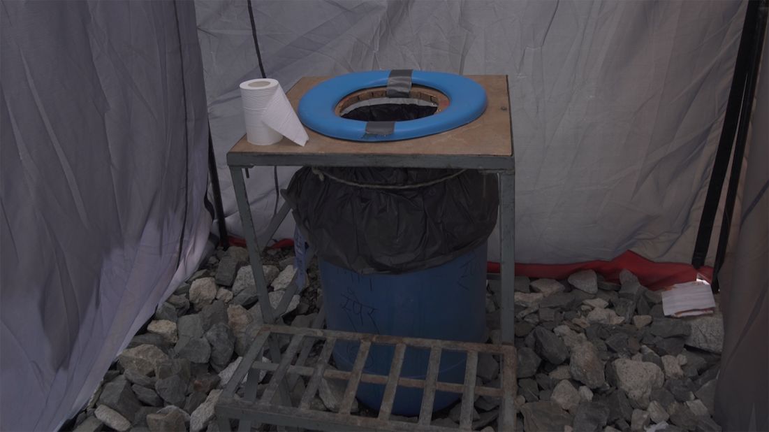 But at base camp, Nepalese authorities have installed portable toilets in the form of blue barrels. According to Fogle, the rule at base camp is to not mix urine with feces. The blue barrels are solely for solid human waste. 