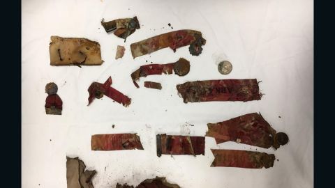 Various medals and ribbons found in time capsule.