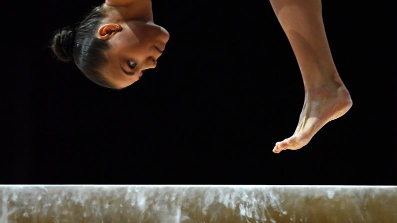 Sofia Bjoernholdt competes on the beam in the qualification for the Women's Apparatus Finals of the Glasgow 2018 European Artistic Gymnastics Championships, in Glasgow, Britain, on Thursday, August 2. 