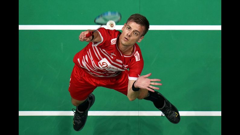Hans-Kristian Solberg Vittinghus hits a shot against Kai Schaefer during their men's singles match during Day 2 of the Total BWF World Championships 2018 at Nanjing Youth Olympic Games Sport Park on Tuesday, July 31, in Nanjing, China.  