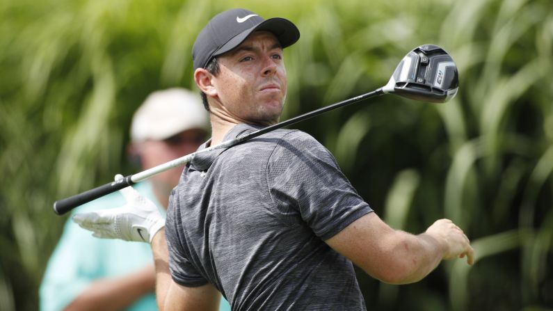 PGA golfer Rory McIlroy loses control of his driver after teeing off on the 16th hole during the first round of the WGC-Bridgestone Invitational golf tournament on Thursday, August 2 in Akron, Ohio. 