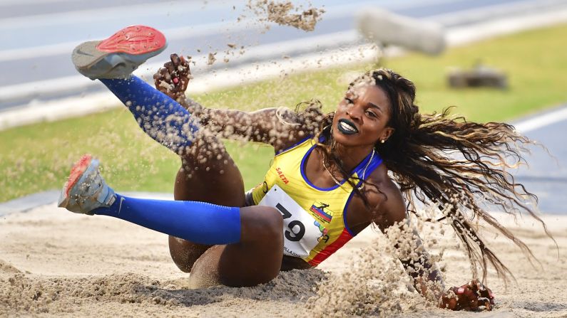 Caterine Ibargüen competes in the women's triple jump event during the 2018 Central American and Caribbean Games in Barranquilla, Colombia, on Wednesday, August 1. 