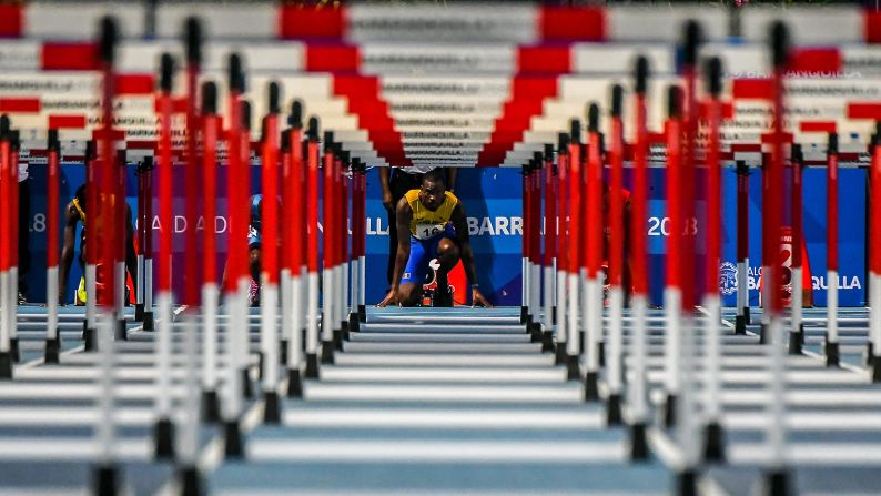 Shane Brathwaite competes in the men's 110 m hurdles competition during the 2018 Central American and Caribbean Games in Barranquilla, Colombia, on Monday, July 30. 