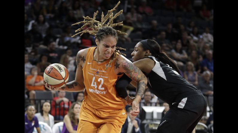 Las Vegas Aces center Kelsey Bone, right, fouls Phoenix Mercury center Brittney Griner during the first half of a WNBA basketball game Wednesday, August 1, in Las Vegas. 