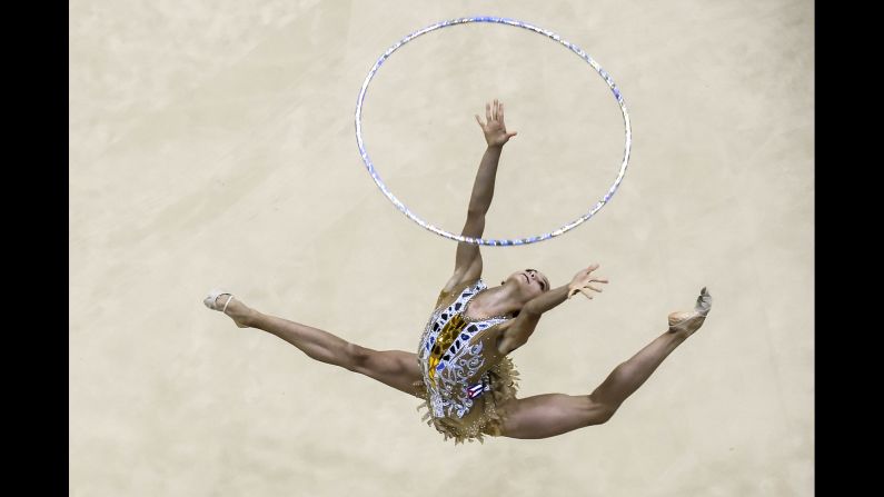 Gretel Mendoza competes in the Women's Rhythmic Gymnastics Hoop competition during the 2018 Central American and Caribbean Games, at the Puerta de Oro Centre in Barranquilla, Colombia, on Monday, July 30.  