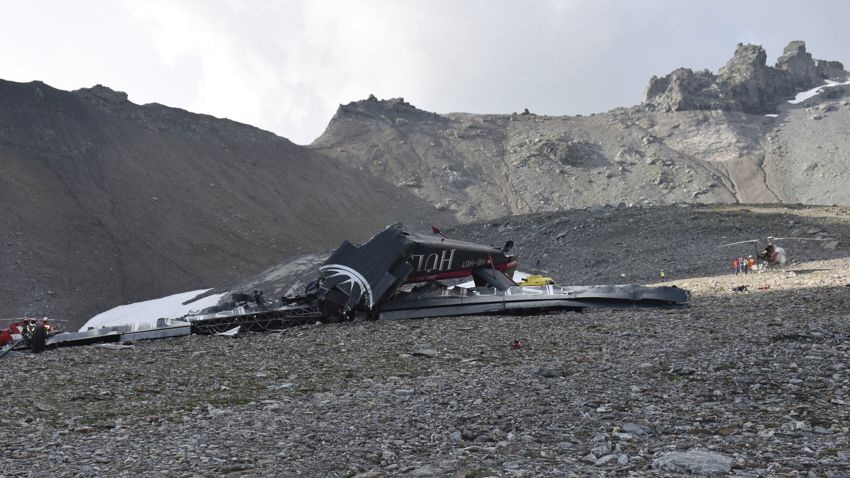 The photo provided by Police Graubuenden shows the wreckage of the old-time propeller plane Ju 52  after it went down went down Saturday Aug, 4 2018 on the Piz Segnas mountain above the Swiss Alpine resort of Flims, striking the mountain's western flank about 2,540 meters (8,330 feet) above sea level.  All 20 people on board were killed, police said Sunday, Aug. 5, 2018.  (Polizei Graubuenden via AP)