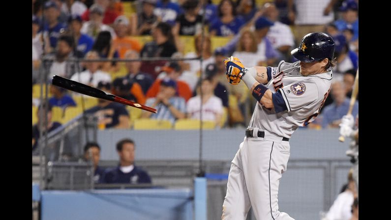 Houston Astros' Josh Reddick breaks his bat as he pops out during the fifth inning of a baseball game against the Los Angeles Dodgers on Friday, August 3, in Los Angeles. 