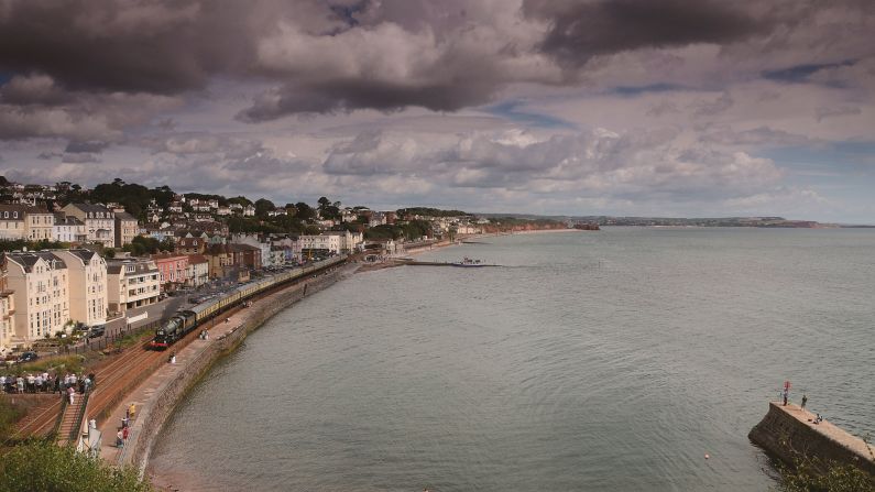 <strong>Real deal:</strong> Robin and Taliesin both prefer working railways. "Our first choice is always steam on the main line rather than a heritage railway," says Robin. <em>Pictured here: GWR King No. 6024 King Edward I passing Dawlish</em>