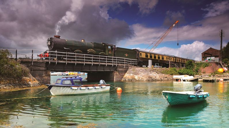 <strong>Railway fanatic:</strong> Robin Coombes is a life-long train fanatic. "As a child it was everything about trains -- toys then models, reading books and hours spent watching trains at the local station," he tells CNN Travel. <em>Pictured here: GWR King No. 6024 King Edward I at Kingswear</em>