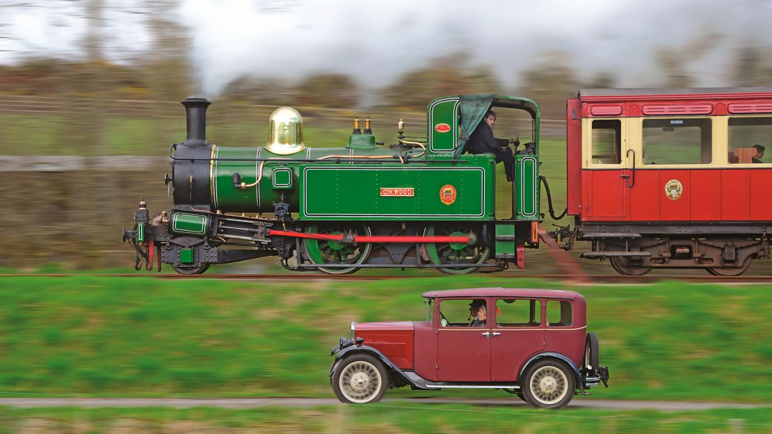 Pictured here: Racing the train. Beyer, Peacock & Co. Isle of Man No. 10 G. H. Wood races a 1931 Swift Crusader at Scanton, Isle of Man.