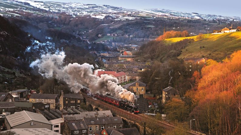 <strong>Making memories</strong>: Robin has many happy rail memories of the railway: "Standing on the end of Cardiff General Station and watching a gleaming Britannia pacific class locomotive with large reporting numbers and headboard on the front, leave the station with a thunderous bark enveloped in clouds of steam, setting off for London Paddington with the Red Dragon." <em>Pictured here: LMS 8F No.48151 at Walsden</em>