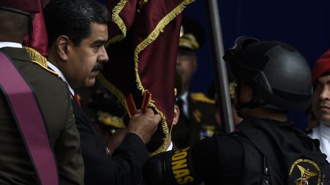 Venezuelan President Nicolas Maduro (left) at the ceremony where the attack occured.