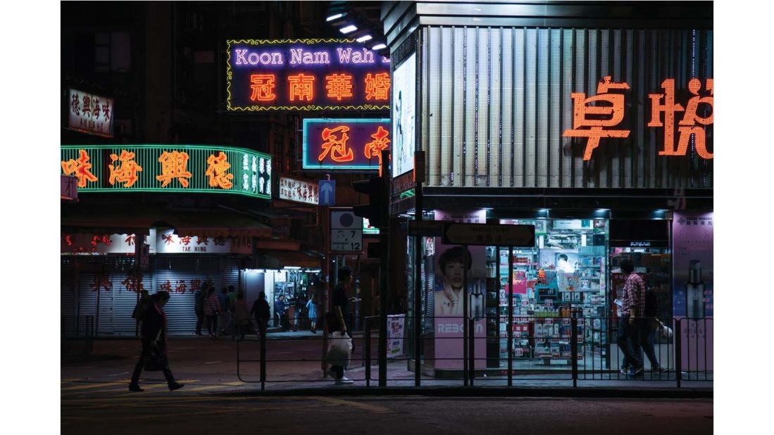 <strong>Late nights:</strong> One night in Kowloon, the photographer found himself compelled to shoot Hong Kong's famous neon signs. "I was trying to get the neon as clean and clear as possible -- I didn't want it to appear overly bright," says Hab. "I also wanted to have the sidewalk and stores in the shot." 