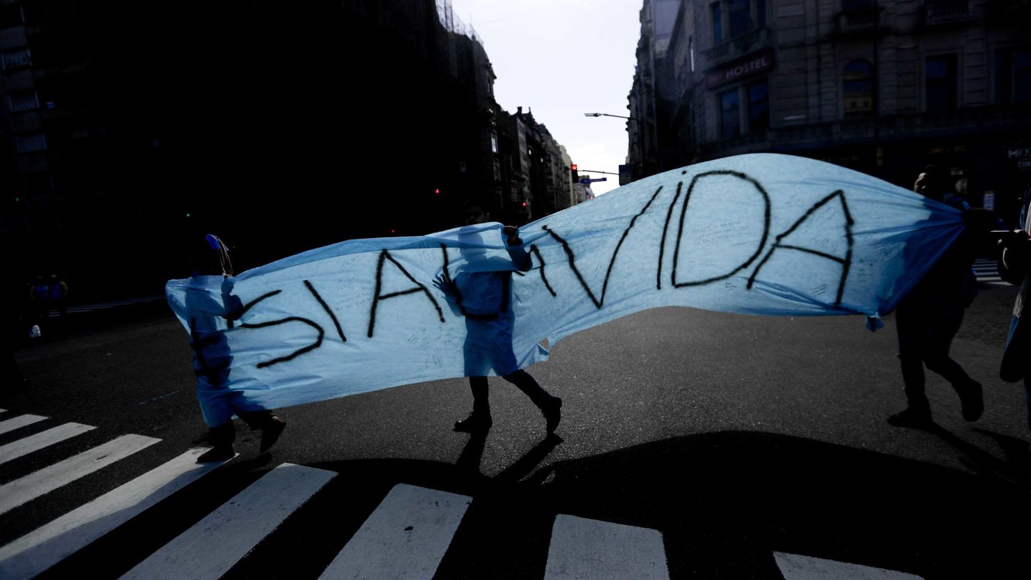 Anti-abortion activists carry a "Yes To Life" banner during a protest in Buenos Aires. 