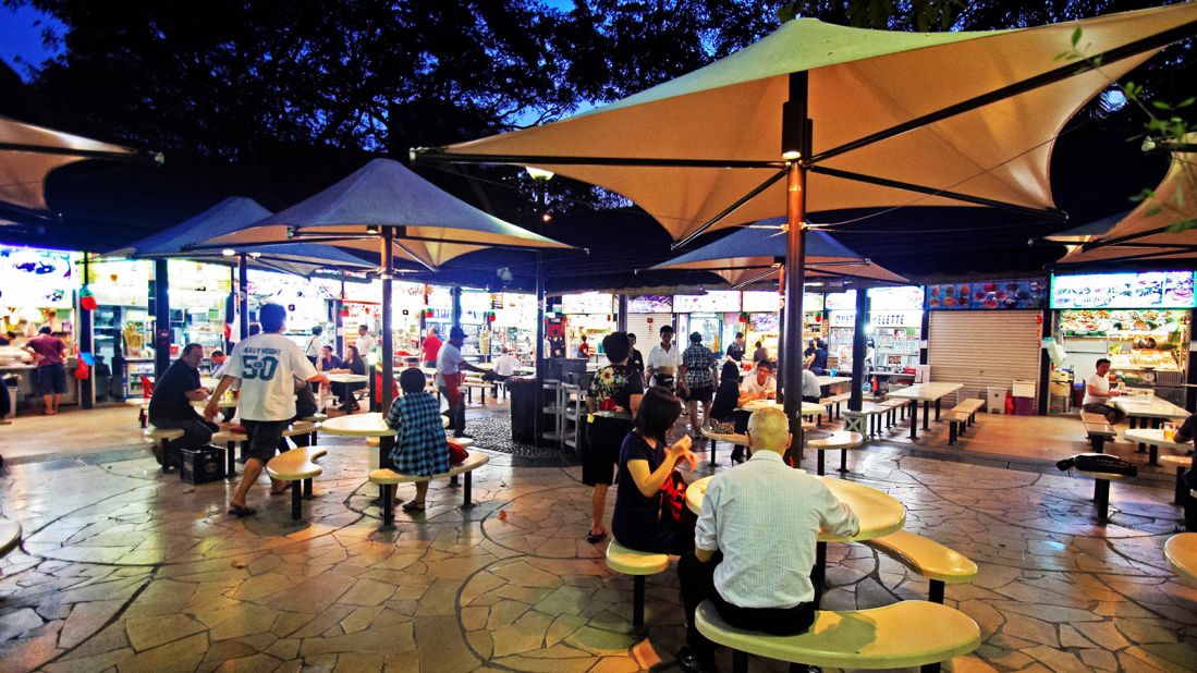 <strong>Food Centers: </strong>While the book refers to the historic Lau Pa Sat hawker center, where the main protagonists head for satay on their arrival in Singapore, the movie picked the Newton Food Center (pictured here) for that scene.
