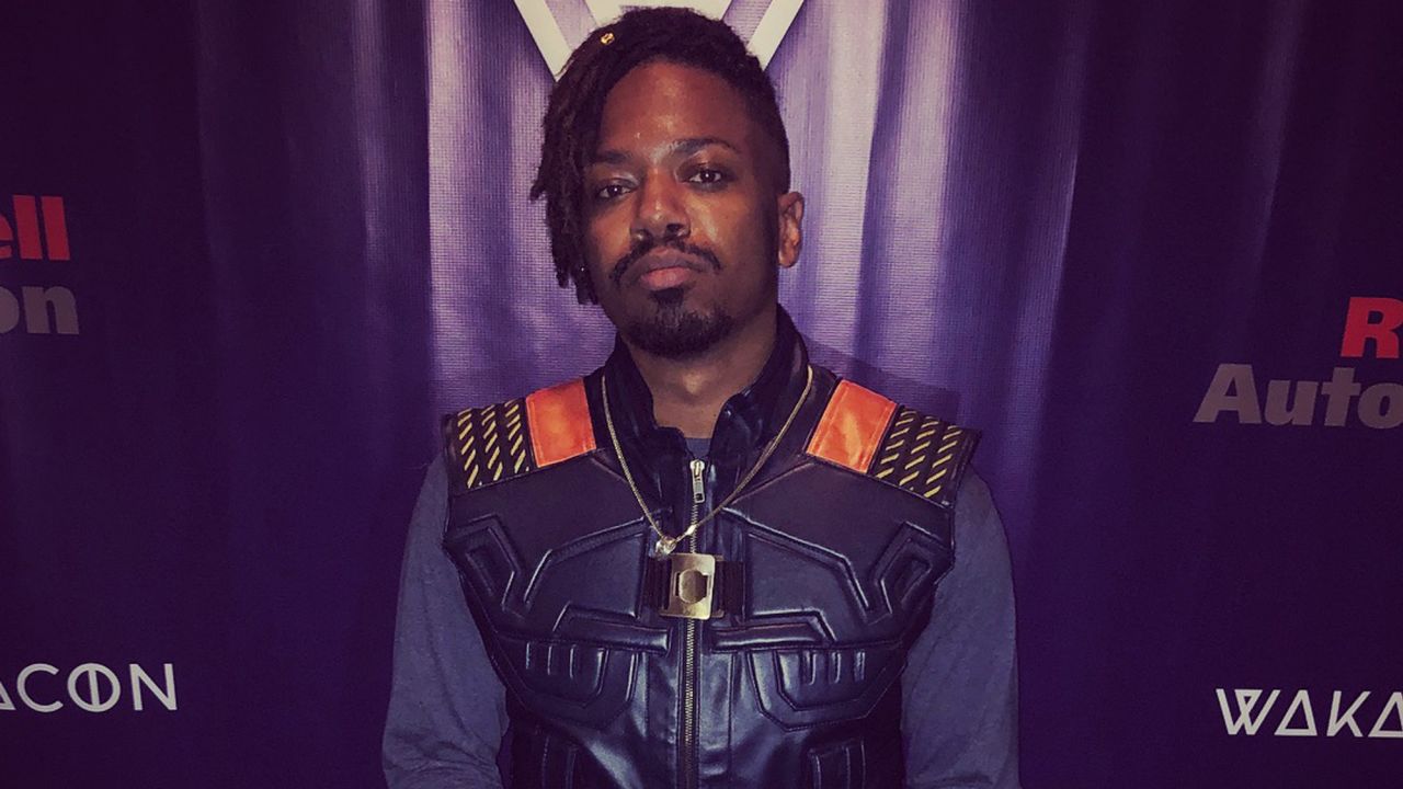Math teacher David Mikel Etheridge wore three different Killmonger costumes to the event