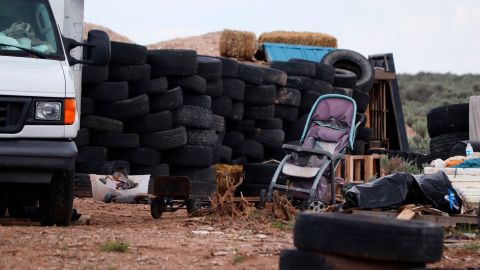 Stacks of tires and other debris appear at the filthy compound last week in Amalia, New Mexico.