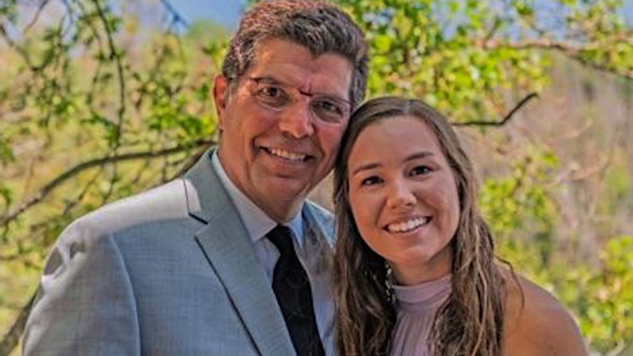 Mollie Tibbetts, here with her father, disappeared on an evening jog on July 18.