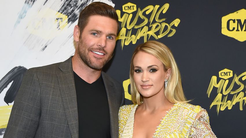 Mike Fisher (L) and Carrie Underwood attend the 2018 CMT Music Awards at Bridgestone Arena on June 6, 2018 in Nashville, Tennessee. Rick Diamond/Getty Images/CMT