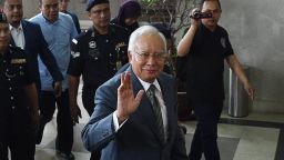 Malaysia's former prime minister Najib Razak arrives for a court appearance at the Duta court complex in Kuala Lumpur on August 8, 2018. - Malaysia's disgraced ex-leader Najib Razak faces new charges in court on August 8 under anti-money laundering laws in a case linked to a multi-billion-dollar graft scandal, authorities said. (Photo by MOHD RASFAN / AFP)        (Photo credit should read MOHD RASFAN/AFP/Getty Images)