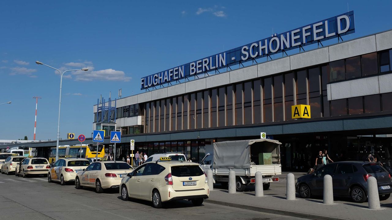 SCHOENEFELD, GERMANY - JULY 3: Taxis stand in front of the main terminal of Schoenefeld Airport near Berlin on July 3, 2018 in Schoenefeld, Germany. The airport was due to be replaced by the nearby, new Berlin-Brandenburg Airport (BER), though completion of the new airport has been delayed year-after-year by safety and other complications. (Photo by Sean Gallup/Getty Images)
