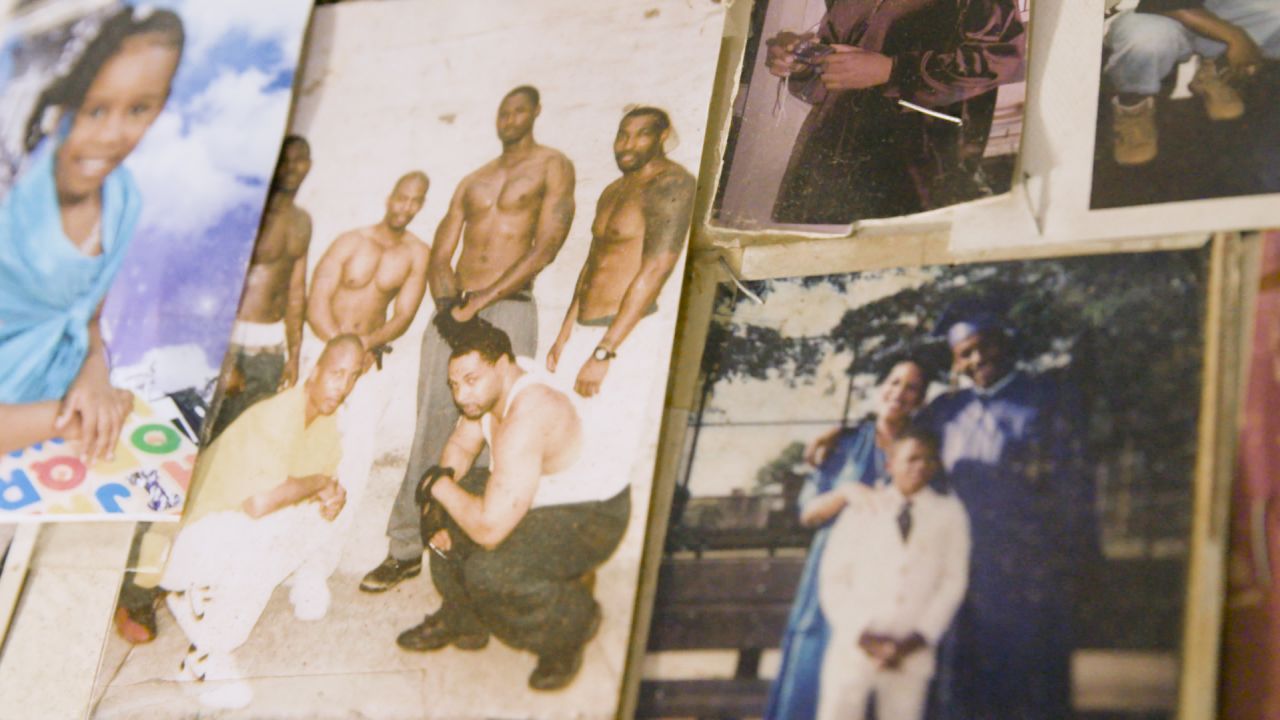 Photos of John Bunn during his time in jail line the walls at the home of his mother, Maureen.