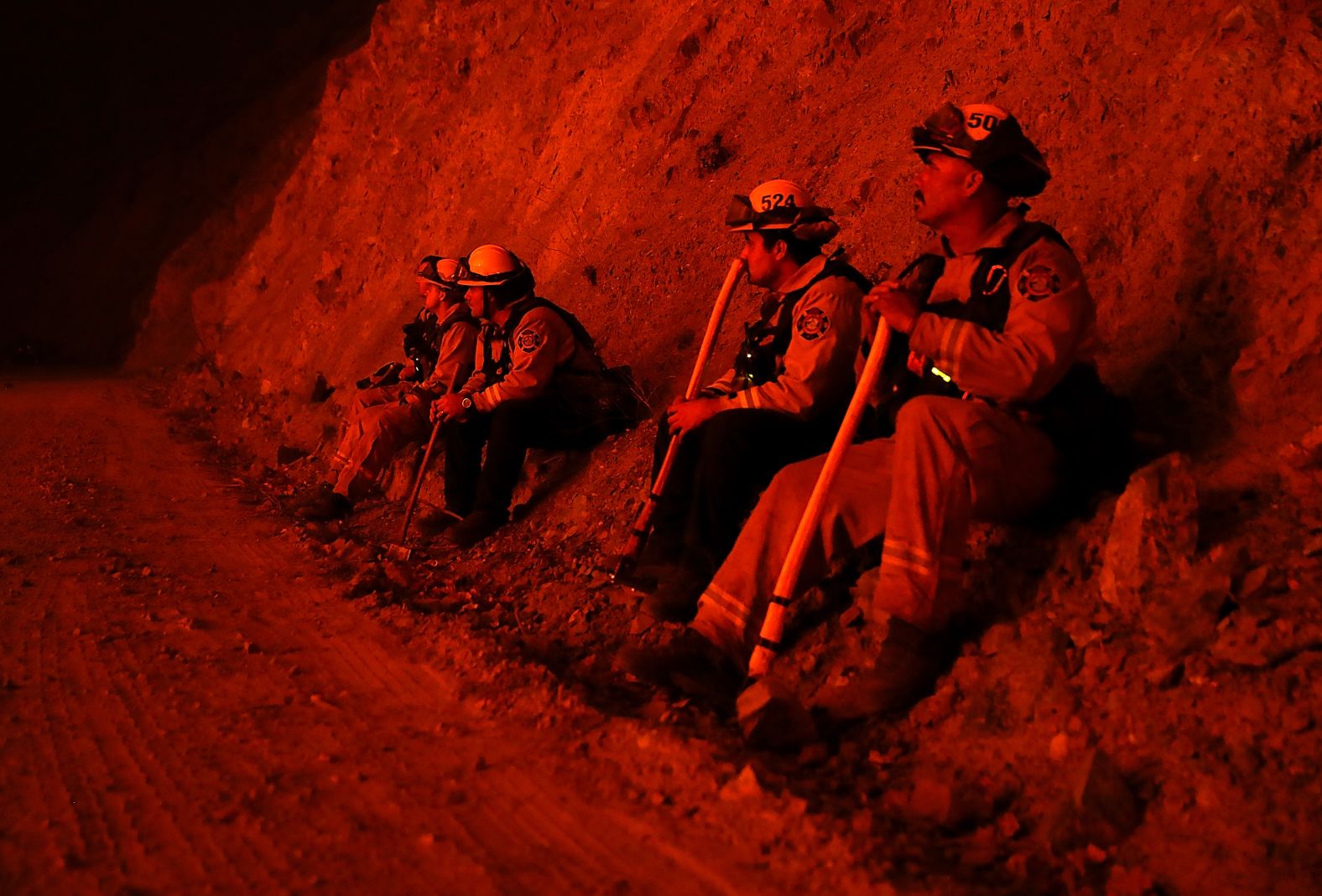 Firefighters work on stopping the Mendocino Complex Fire, which is made up of the River and Ranch fires.