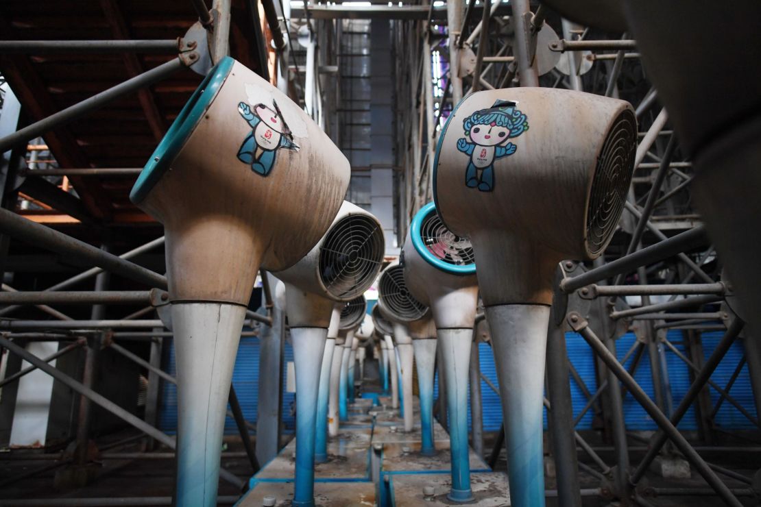 Fans stored under the grandstand of the beach volleyball stadium are no longer in use.