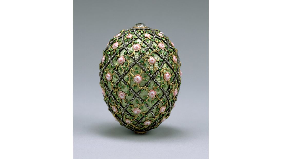 The Rose Trellis Easter Egg, completed in 1907, was constructed by combining gold with translucent green and pink enamel, as well as a lattice of rose-cut diamonds.