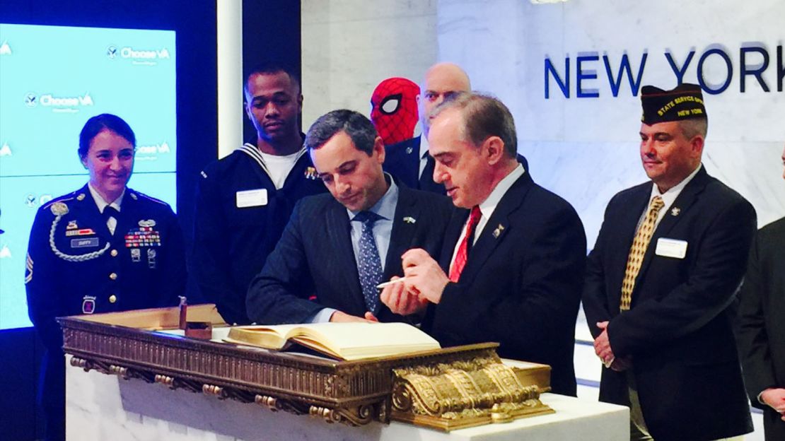 A representatives from Marvel and representatives from several veterans groups attend an event at the NYSE on November 7, 2017.
