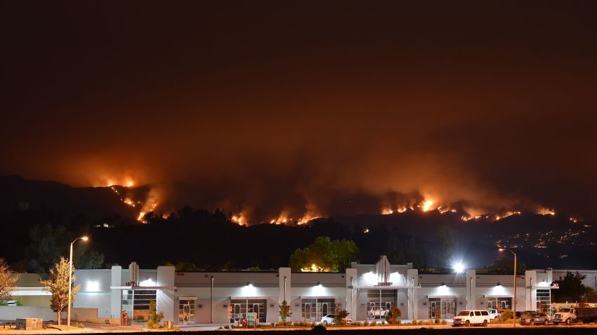 The Holy Fire burns in the Cleveland National Forest, near Lake Elsinore, California on August 8, 2018. - The Holy Fire has burned more than 4,000 acres about 75 miles (120km) southeast of Los Angeles and is one of 18 wildfires burning across California. (Photo by Robyn Beck / AFP)        (Photo credit should read ROBYN BECK/AFP/Getty Images)