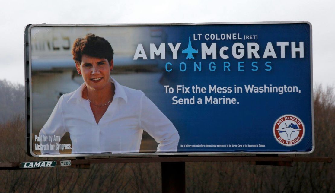 Amy McGrath's campaign sign touts her experience as a Marine.