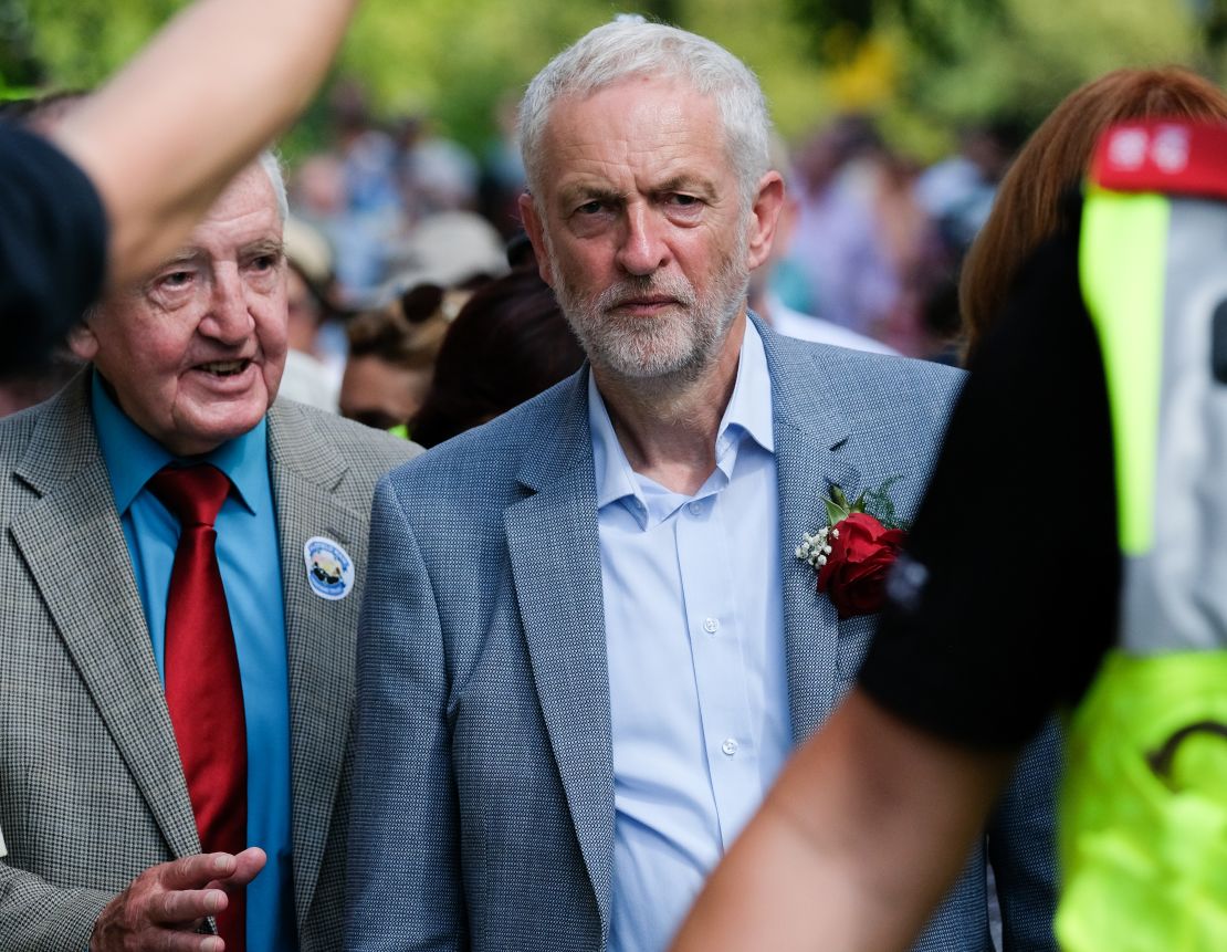 Corbyn walks through crowds after delivering a speech in Durham, England in July.