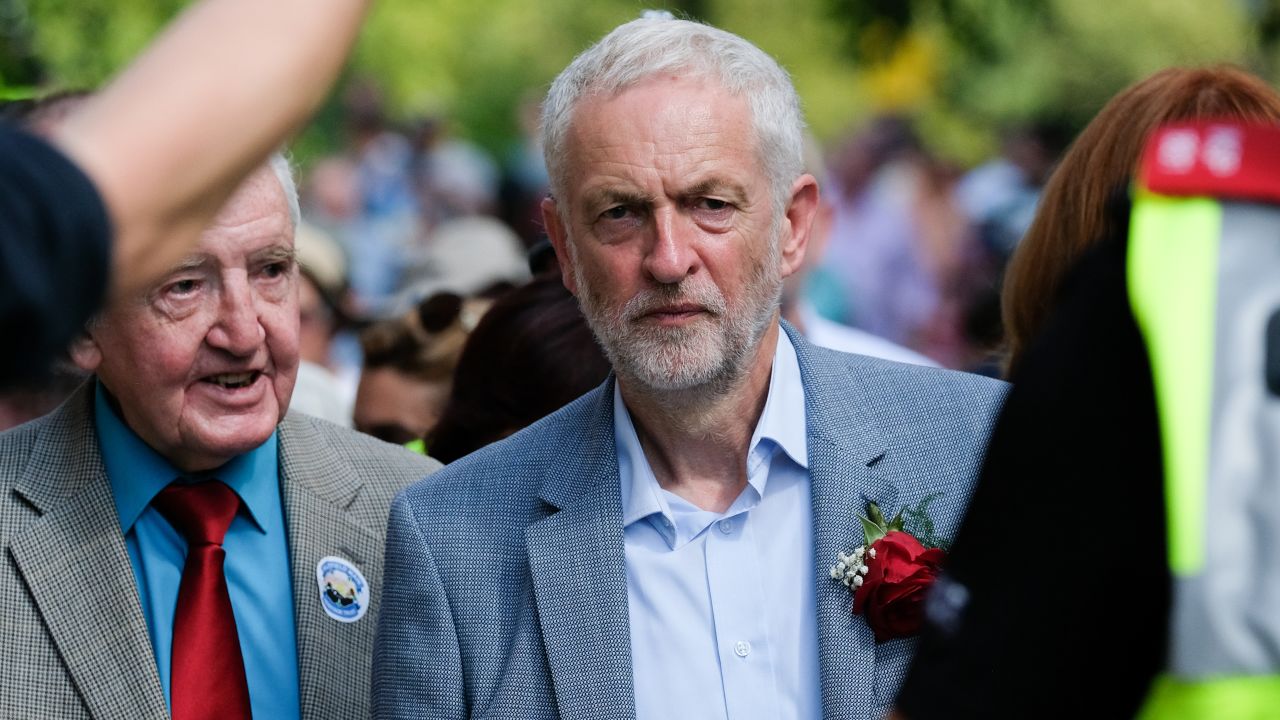 Corbyn walks through crowds after delivering a speech in Durham, England in July.