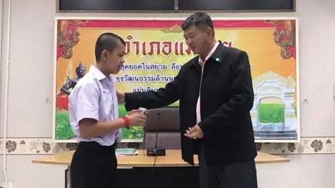 16-year-old Ponchai Khamluang is granted Thai citizenship, along with two other boys and the coach of the Wild Boar soccer team.