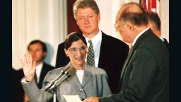 WASHINGTON, DC - AUGUST 10:  Chief Justice of the U.S. Supreme Court William Rehnquist (R) administers the oath of office to newly-appointed U.S. Supreme Court Justice Ruth Bader Ginsburg (L) as U.S. President Bill Clinton looks on 10 August 1993. Ginsburg is the 107th Supreme Court justice and the second woman to serve on the high court.  (Photo credit should read KORT DUCE/AFP/Getty Images)