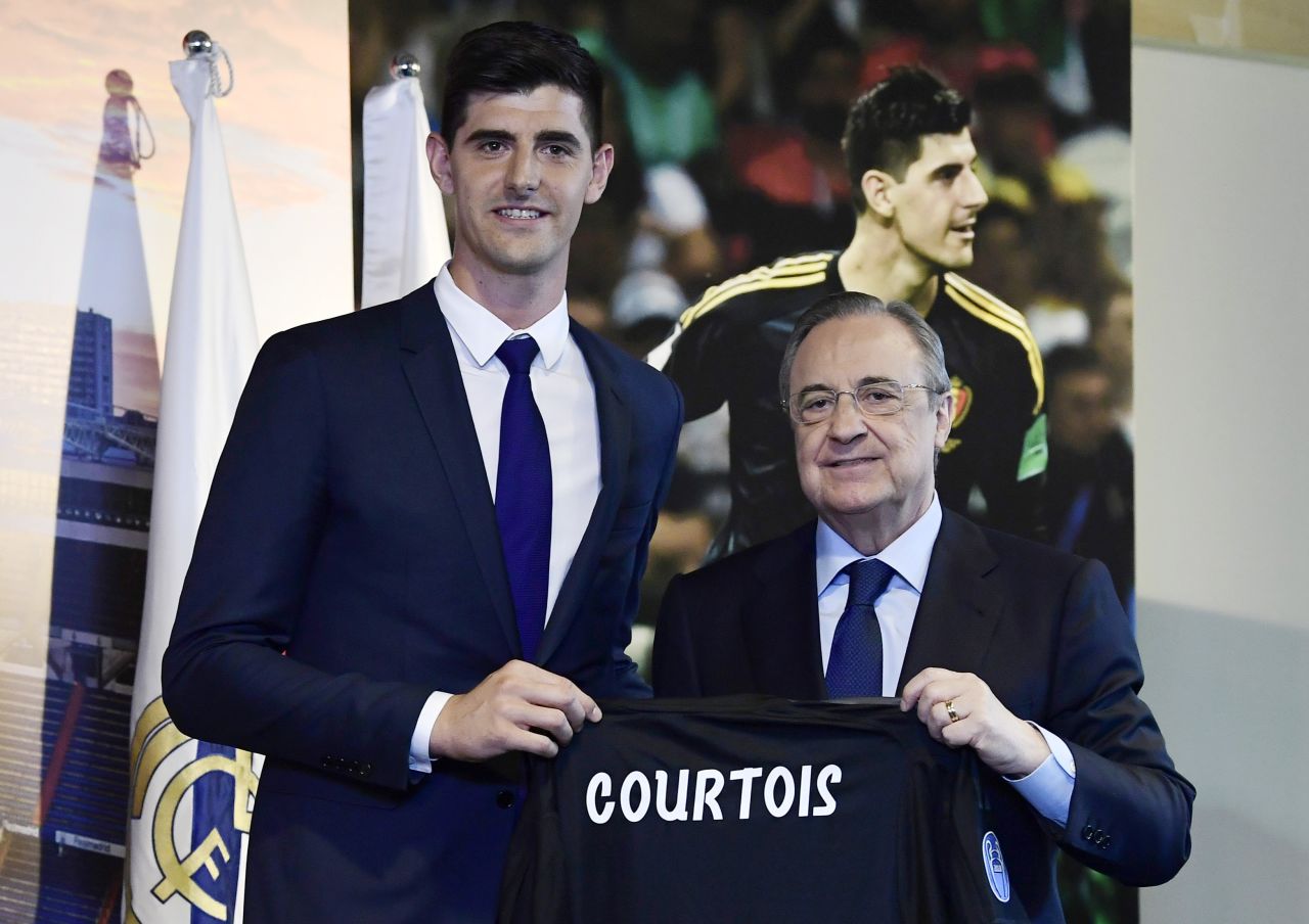 After four years and two Premier League titles with Chelsea, Belgian keeper Thibaut Courtois is off to Real Madrid on a six-year contract. Here he stands with Real Madrid president Florentino Perez during his presentation.