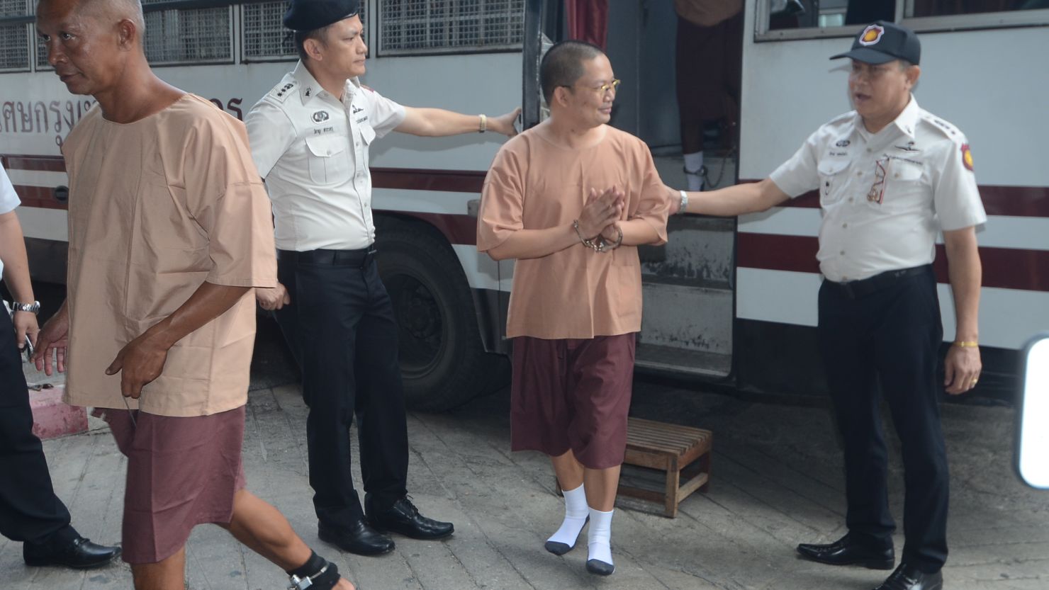 Disgraced former Buddhist monk Wiraphon Sukphon arrives at a criminal court before being sentenced to 114 years in prison for money laundering, fraud and violating the Computer Crime Act, in Bangkok.