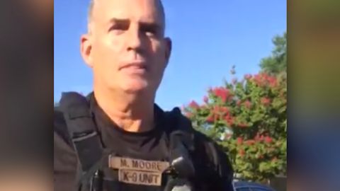 Officer Michael Moore was fired after telling a group of African-American men that "you don't belong in my city."