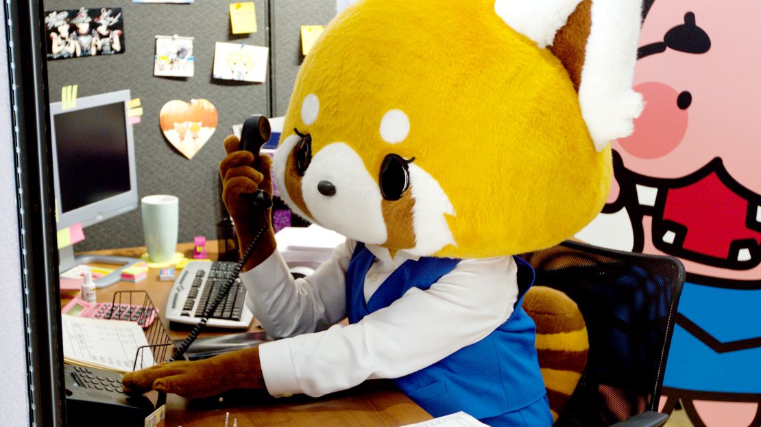 Aggretsuko works at her desk at Sanrio's office in California.