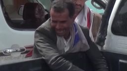 yemen father son body airstrike