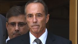 US Representative Chris Collins (L), a Republican from the of the 27th Congressional District of New York, leaves US Federal Court in New York on August 8, 2018 after being indicted on insider trading - Collins, one of the first US lawmakers to declare support for Donald Trump's presidential candidacy, was indicted by federal prosecutors Wednesday on charges of securities fraud connected to an alleged insider trading scheme. (Photo by TIMOTHY A. CLARY / AFP)        (Photo credit should read TIMOTHY A. CLARY/AFP/Getty Images)