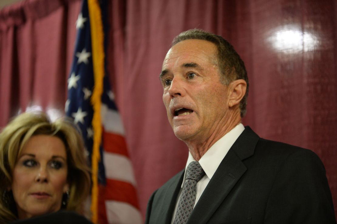 Chris Collins, with his wife Mary at his side, holds a news conference in response to his arrest for insider trading on August 8, 2018 in Buffalo, New York. 