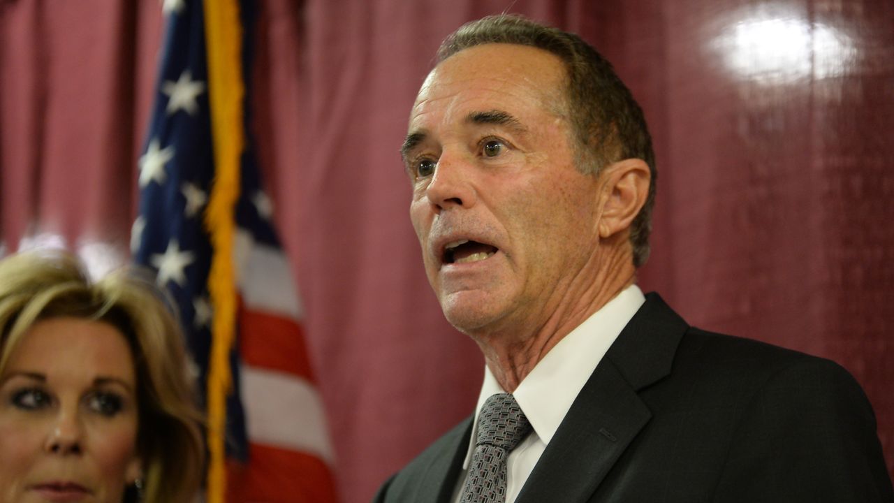 BUFFALO, NY - AUGUST 08: U.S. Rep. Chris Collins (R-NY), with his wife Mary at his side, holds a news conference in response to his arrest for insider trading on August 8, 2018 in Buffalo, New York. Collins, along with son Cameron Collins and his fiancé's father Stephen Zarsky, were arraigned today in Manhattan federal court on charges of insider trading, conspiracy to commit fraud, and lying to federal officials.   (Photo by John Normile/Getty Images)