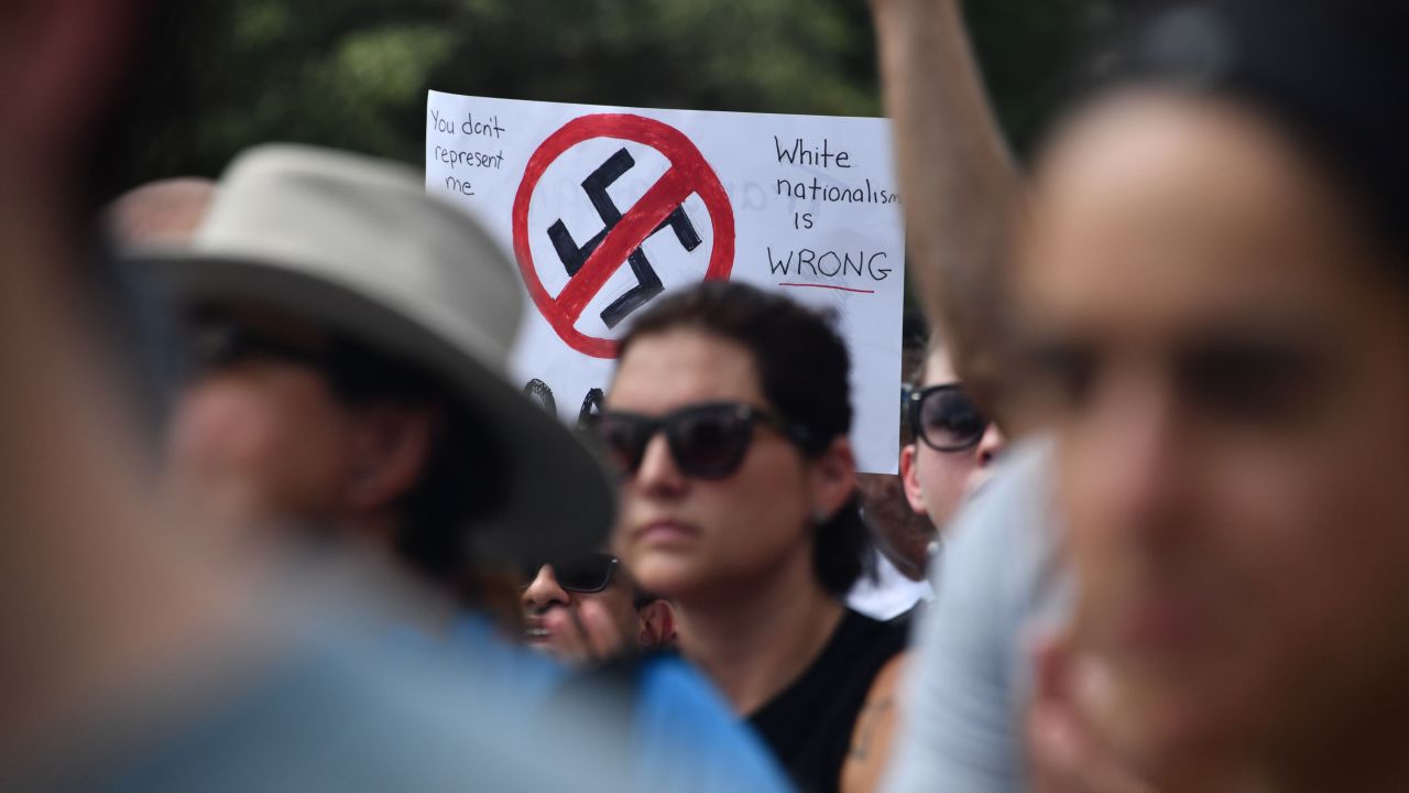 Demonstrators opposed to a far-right rally near the White House gather on August 12, 2018, one year after deadly violence at a similar protest in Charlottesville, Virginia.