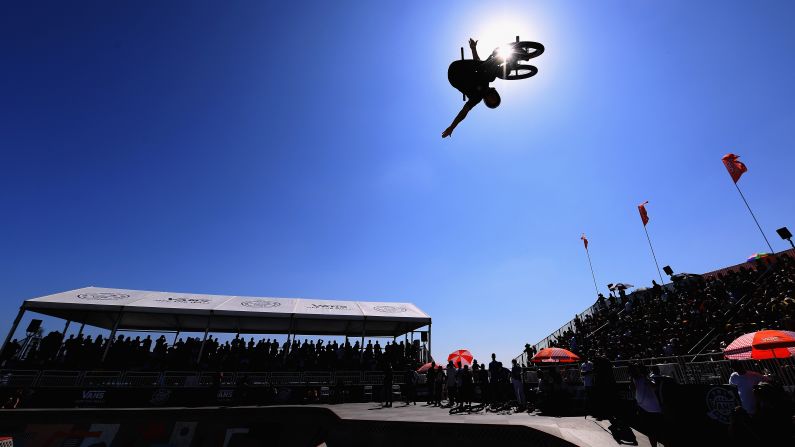 BMX rider Larry Edgar soars through the air on Sunday, August 5, during a Pro Cup event in Huntington Beach, California.